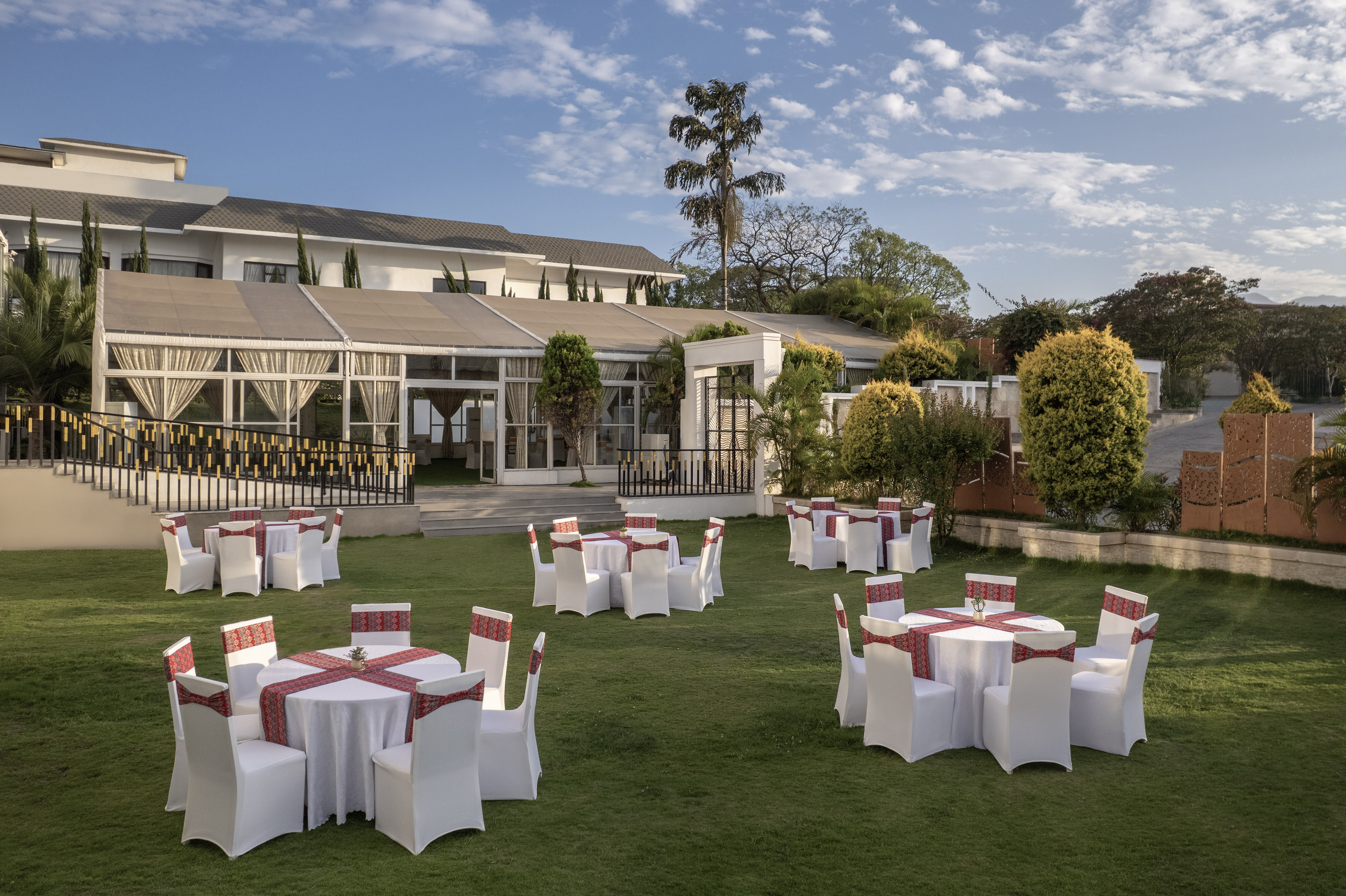 Outdoor lawn event setup in the hotel garden